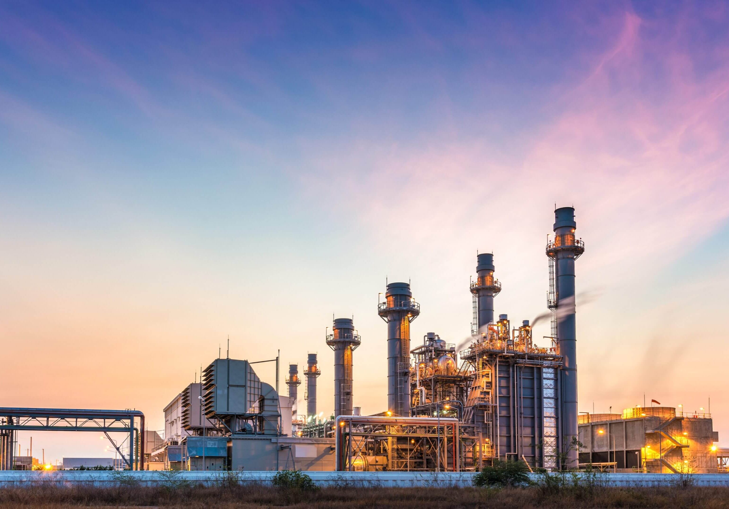 A large industrial plant with pipes and valves.